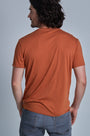 ONNO bamboo t-shirt in Rust Unpatched, Nic is 5'11" and wearing size M.
