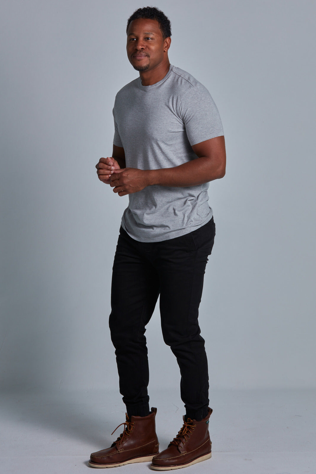 ONNO bamboo t-shirt in Heathered Granite Unpatched, Golden is 6'0" and wearing size L.