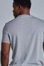 ONNO bamboo t-shirt in Heathered Granite Unpatched, Golden is 6'0" and wearing size L.