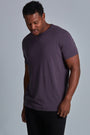 ONNO bamboo t-shirt in Dirty Purple Unpatched, Golden is 6'0" and wearing size L.