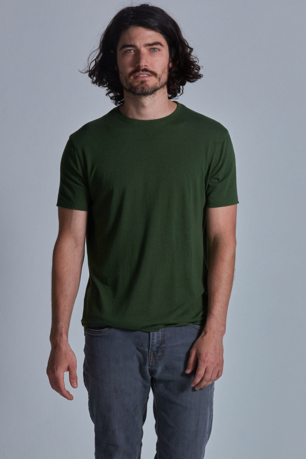 ONNO bamboo t-shirt in Moss Green Unpatched, Nic is 5'11" and wearing size M.