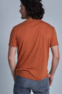 ONNO bamboo t-shirt in Rust, Nic is 5'11" and wearing size M.