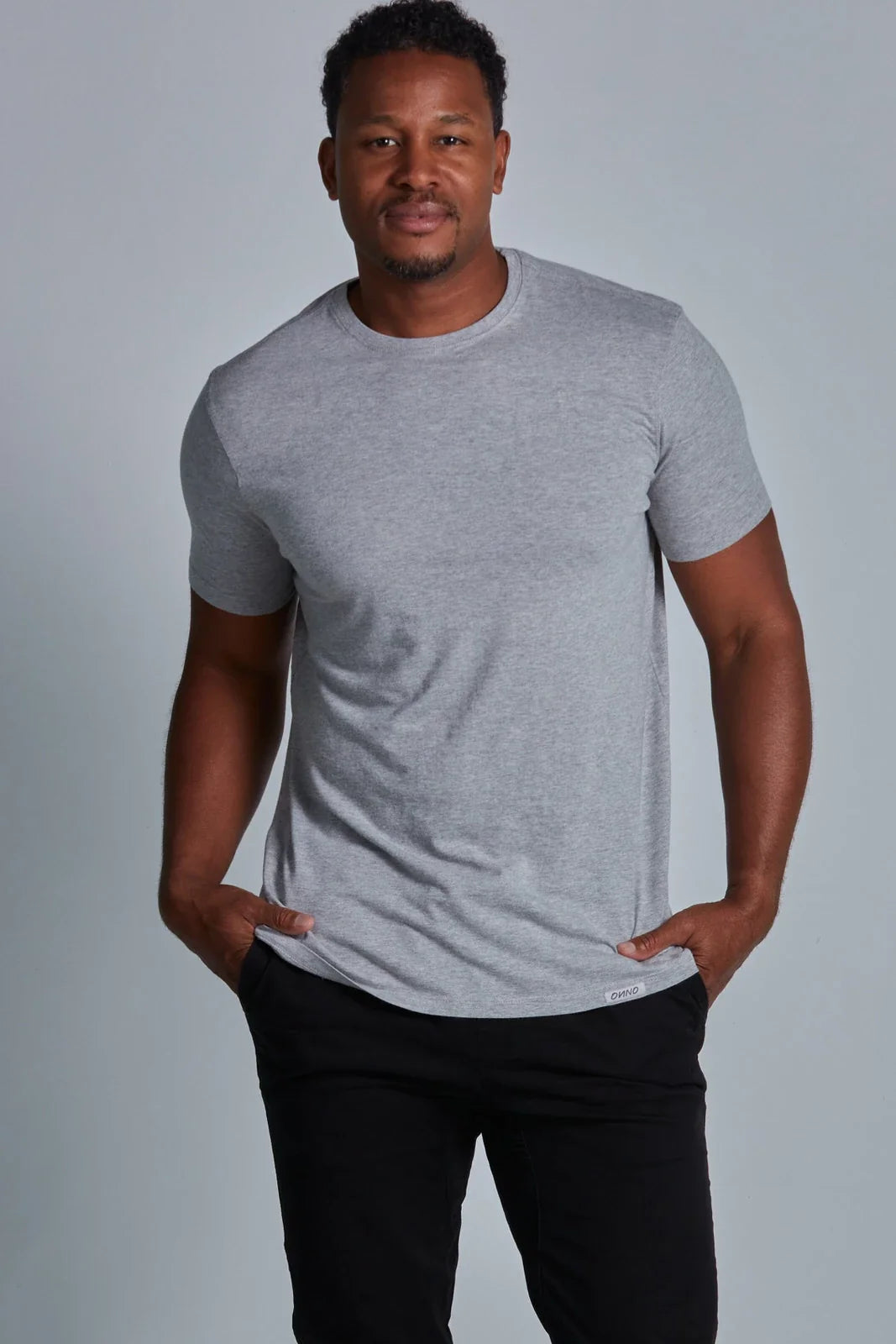 ONNO bamboo t-shirt in Heathered Granite, Golden is 6'0" and wearing size L.