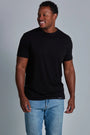 ONNO bamboo t-shirt in Black, Golden is 6'0" and wearing size L.