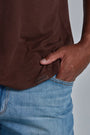 ONNO bamboo t-shirt in Espresso, Golden is 6'0" and wearing size L.