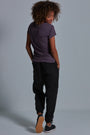 ONNO bamboo t-shirt Dirty Purple Unpatched, Sage is 5'7" and wearing size XS.