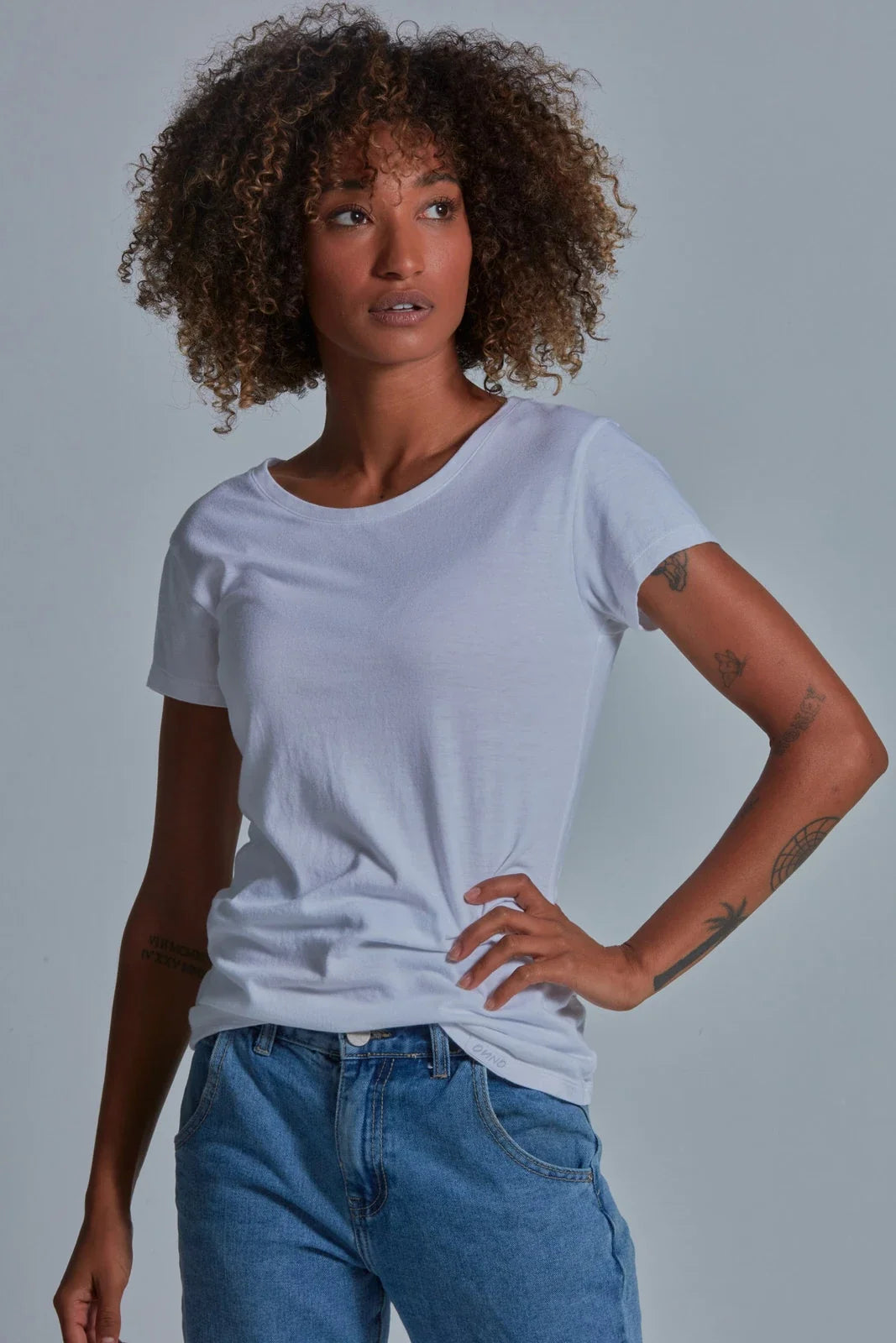 ONNO bamboo t-shirt in White, Sage is 5'7" and wearing size XS.