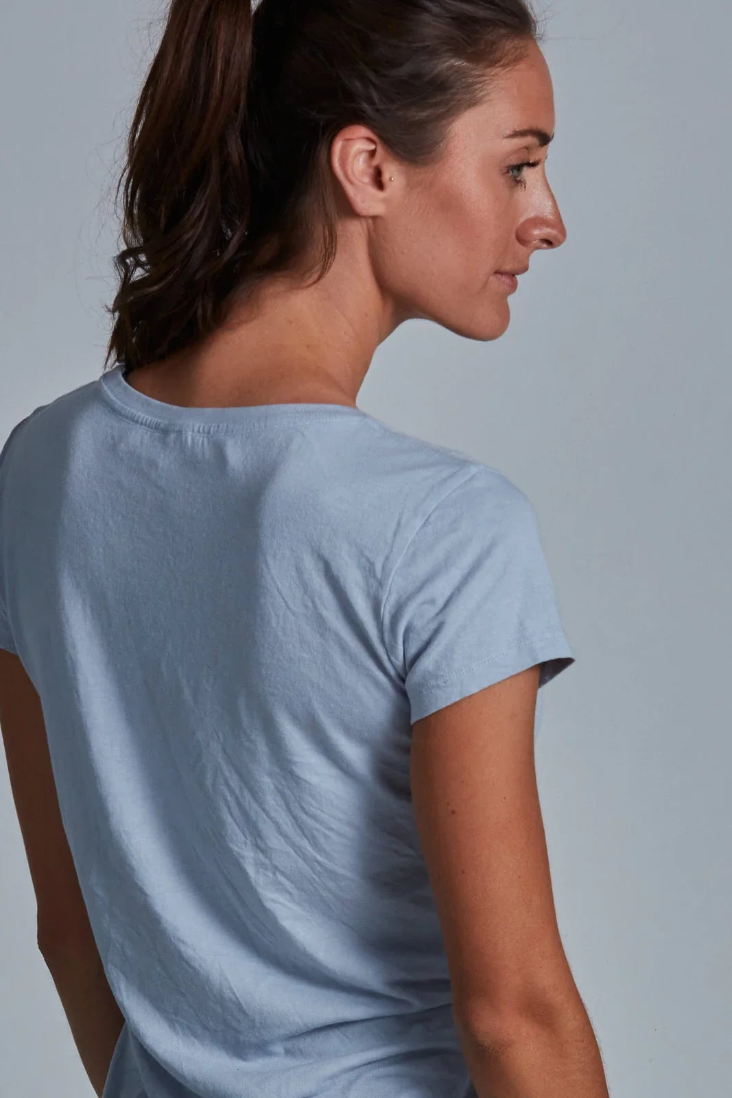 ONNO bamboo t-shirt in Sky Blue, Christina is 5'9" and wearing size S.