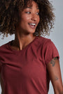 ONNO bamboo t-shirt in Brick, Sage is 5'7" and wearing size XS.