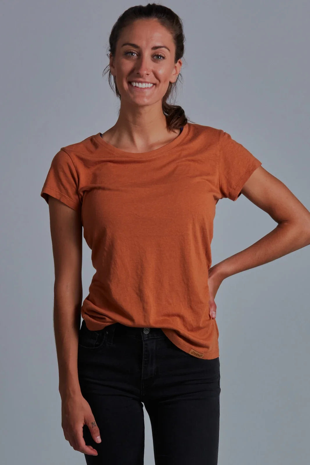 ONNO bamboo t-shirt in Rust, Christina is 5'9" and wearing size S.