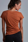 ONNO bamboo t-shirt in Rust, Christina is 5'9" and wearing size S.