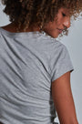 ONNO bamboo t-shirt in Heathered Granite, Sage is 5'7" and wearing size XS.