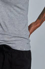 ONNO bamboo t-shirt in Heathered Granite, Sage is 5'7" and wearing size XS.
