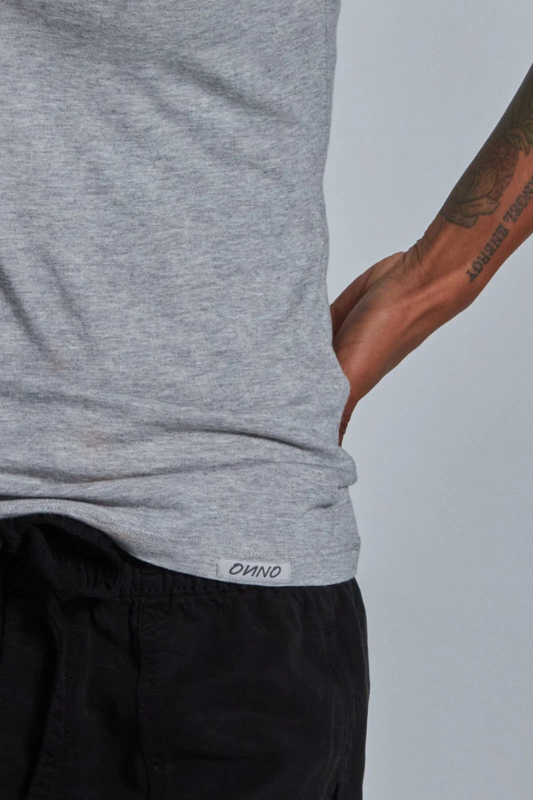 ONNO bamboo t-shirt in Heathered Granite, Sage is 5'7" and wearing size XS.