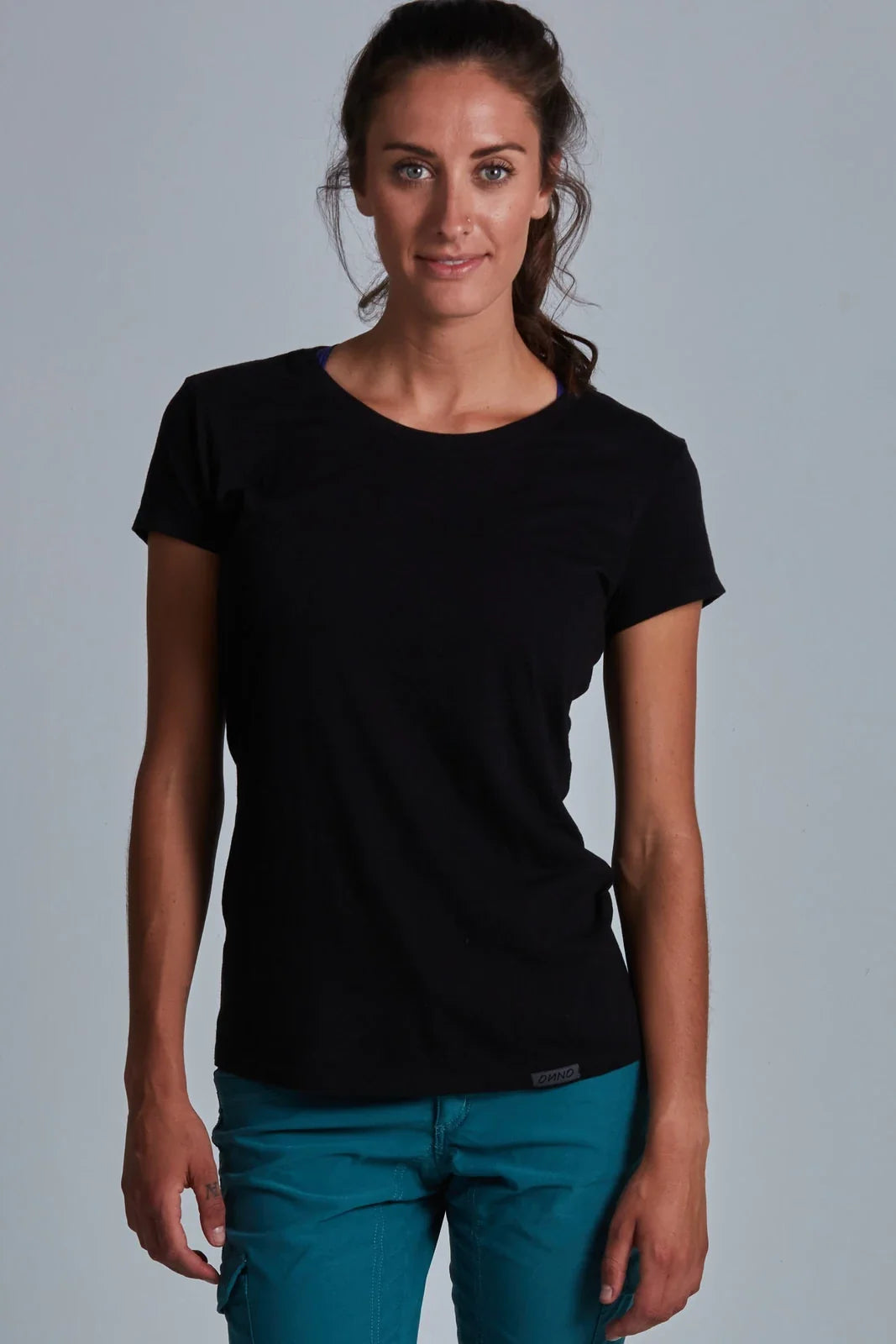 ONNO bamboo t-shirt in Black, Christina is 5'9" and wearing size S.