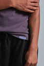 ONNO bamboo t-shirt in Dirty Purple, Sage is 5'7" and wearing size XS.