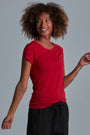 ONNO bamboo t-shirt in Earth Red, Sage is 5'7" and wearing size XS.