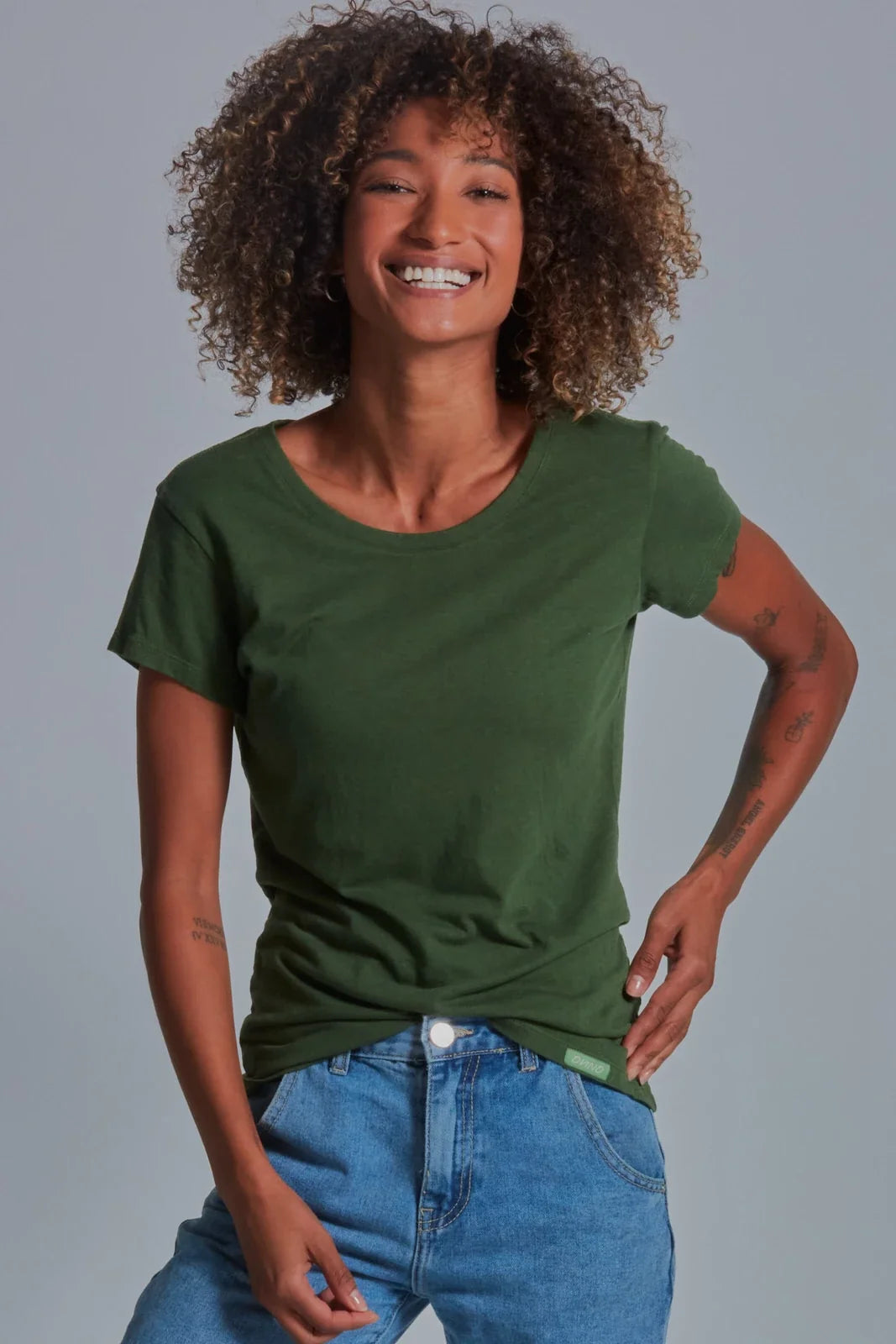 ONNO bamboo t-shirt in Moss Green, Sage is 5'7" and wearing size XS.