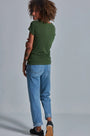 ONNO bamboo t-shirt in Moss Green, Sage is 5'7" and wearing size XS.
