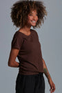 ONNO bamboo t-shirt in Espresso, Sage is 5'7" and wearing size XS.