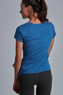 ONNO bamboo t-shirt in Sea Blue, Christina is 5'9" and wearing size S.