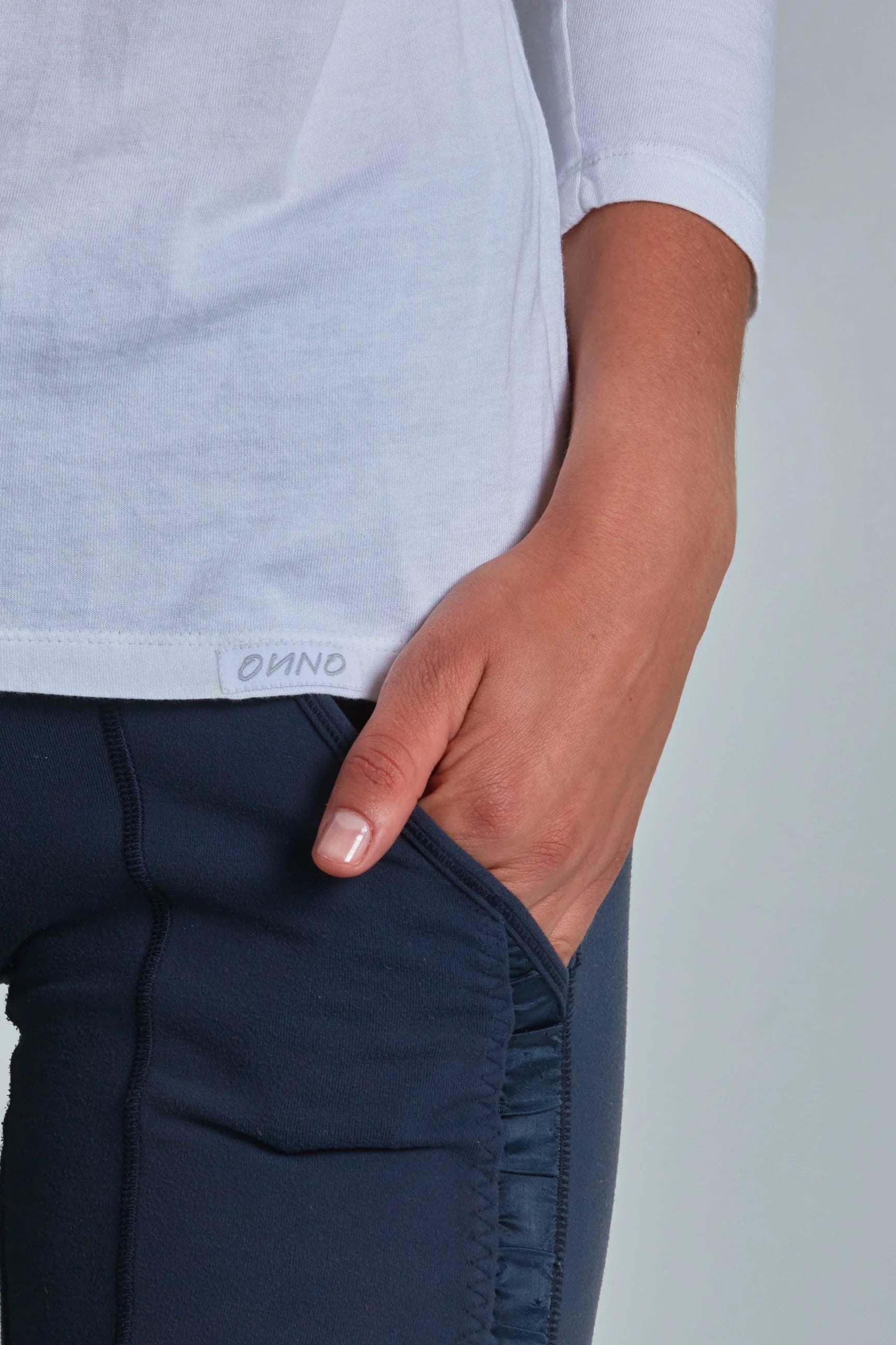 ONNO long sleeve bamboo t-shirt in White, Christina is 5'9" and wearing size S.
