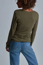 ONNO long sleeve bamboo t-shirt in Cypress, Sage is 5'7" and wearing size XS.