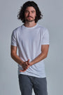 ONNO lyocell bamboo t-shirt in White, Nic is 5'11" and wearing size M.