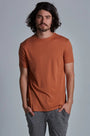 ONNO lyocell bamboo t-shirt in Rust, Nic is 5'11" and wearing size M.
