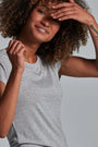 ONNO beechwood t-shirt in Heathered Granite, Sage is 5'7" and wearing size XS.
