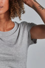 ONNO beechwood t-shirt in Heathered Granite, Sage is 5'7" and wearing size XS.