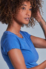 ONNO beechwood t-shirt in Sea Blue, Sage is 5'7" and wearing size XS.
