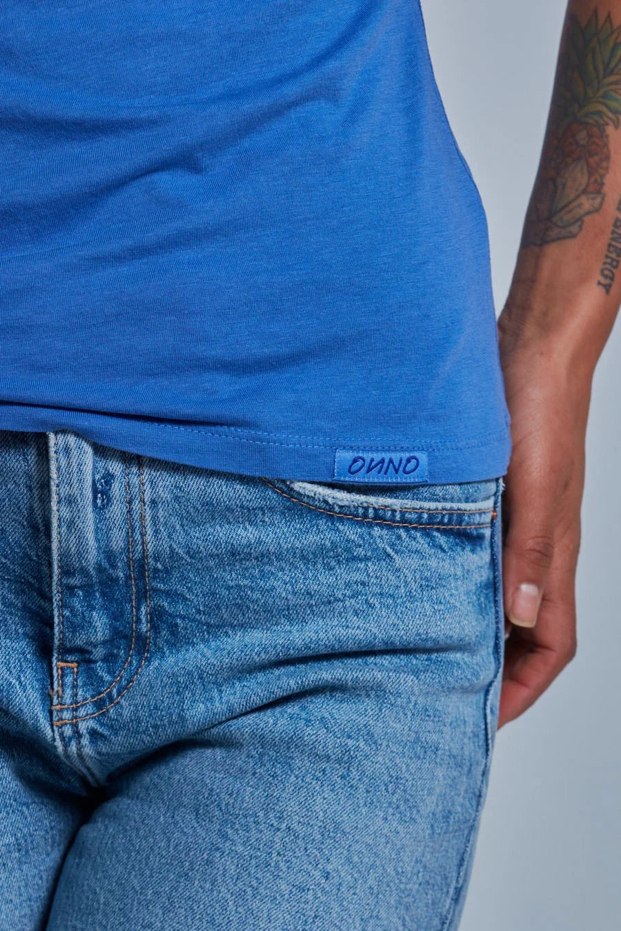 ONNO beechwood t-shirt in Sea Blue, Sage is 5'7" and wearing size XS.