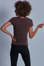 ONNO beechwood t-shirt in Espresso, Sage is 5'7" and wearing size XS.