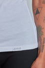ONNO organic cotton t-shirt in White, Sage is 5'7" and wearing size XS.